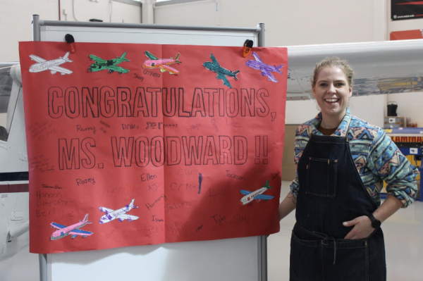 Ms. Woodward with her congratulations poster from her students!